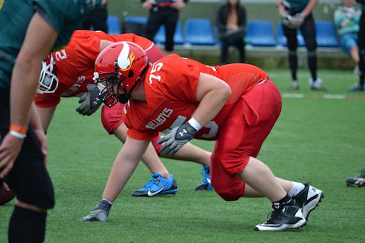 players practicing offensive plays