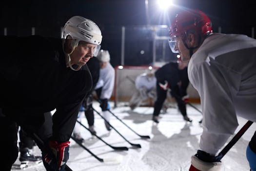 hockey faceoff in action