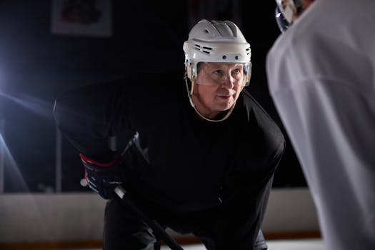 hockey players preparing for a faceoff