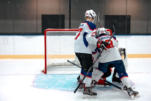 hockey players transitioning between offense and defense