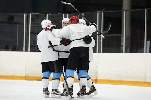 hockey team celebrating a goal