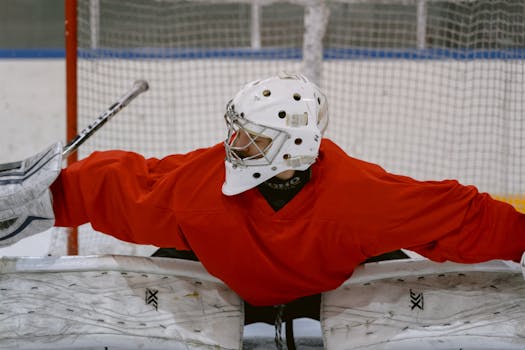 hockey players celebrating a power play goal