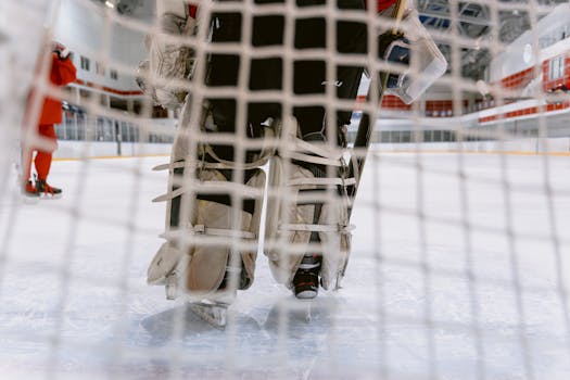 hockey player taking a shot on goal