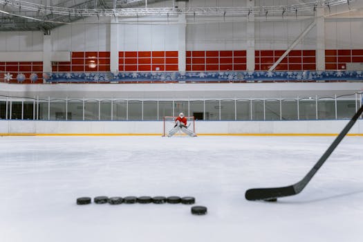 hockey players working together on shooting drills