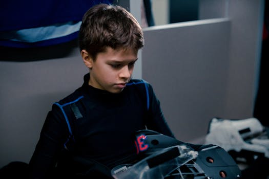 youth goalie preparing for a game